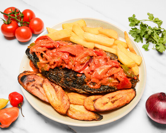 Plated grilled fish with plantain at SUUYAR